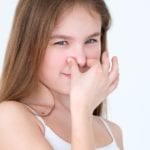 Girl Pinching Nose | HVAC Contractors Reduce Scary Smells | Custom Klimates